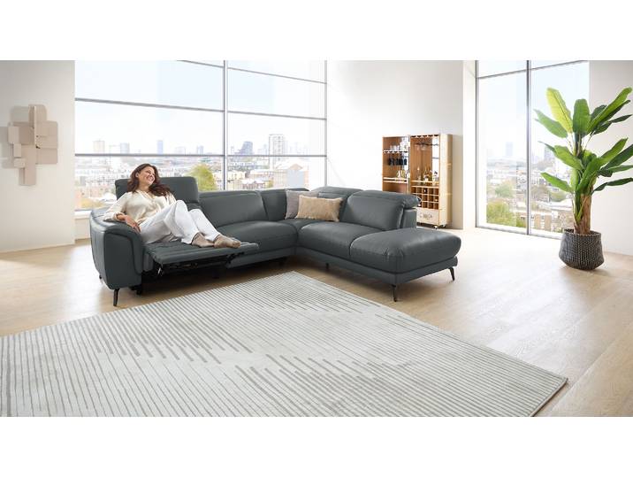 Leder Couch mit motor. Relaxfunktion und Kopfteilverstellung