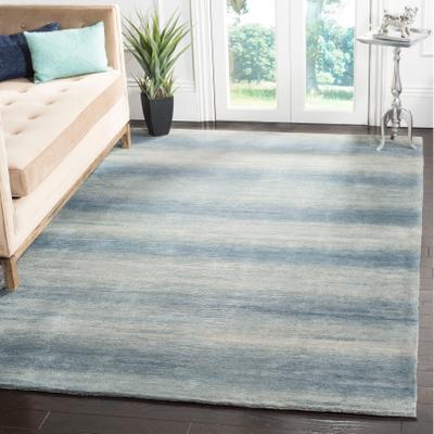 SAFAVIEH Couture Hand-knotted Tibetan Meghana Modern Wool Rug