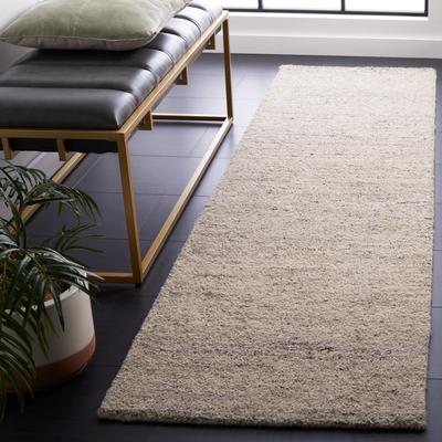 SAFAVIEH Handmade Himalaya Modern & Contemporary Solid Ivory Wool Rug