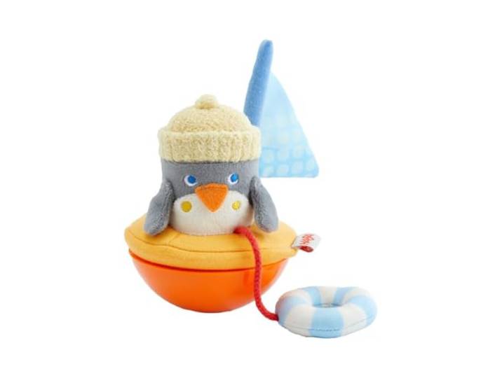 HABA Stehauf Pinguin – Wackelspielzeug mit Klingeleffekt für Babys Selbstaufrichtende Figur mit Schwimmring & Segel – fördert Motorik und Sinneswahrnehmung ab 6 Monaten