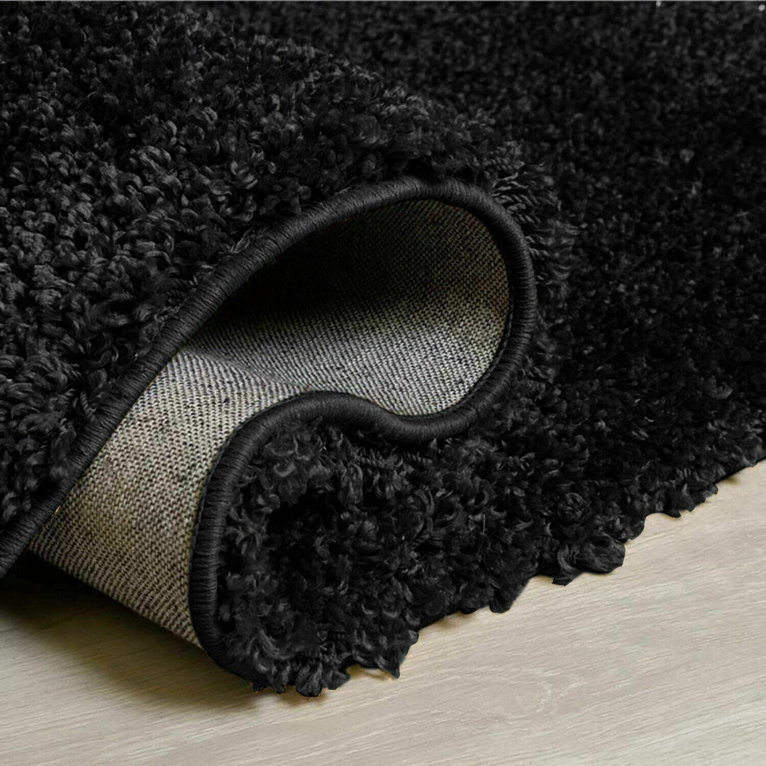 Ebern Designs Epiphany Solid Colour Shag Area Rug Black Rectangle 80 x 150cm