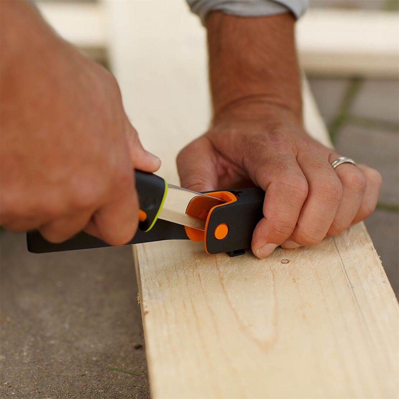 Fiskars Kniv med inbyggd slip