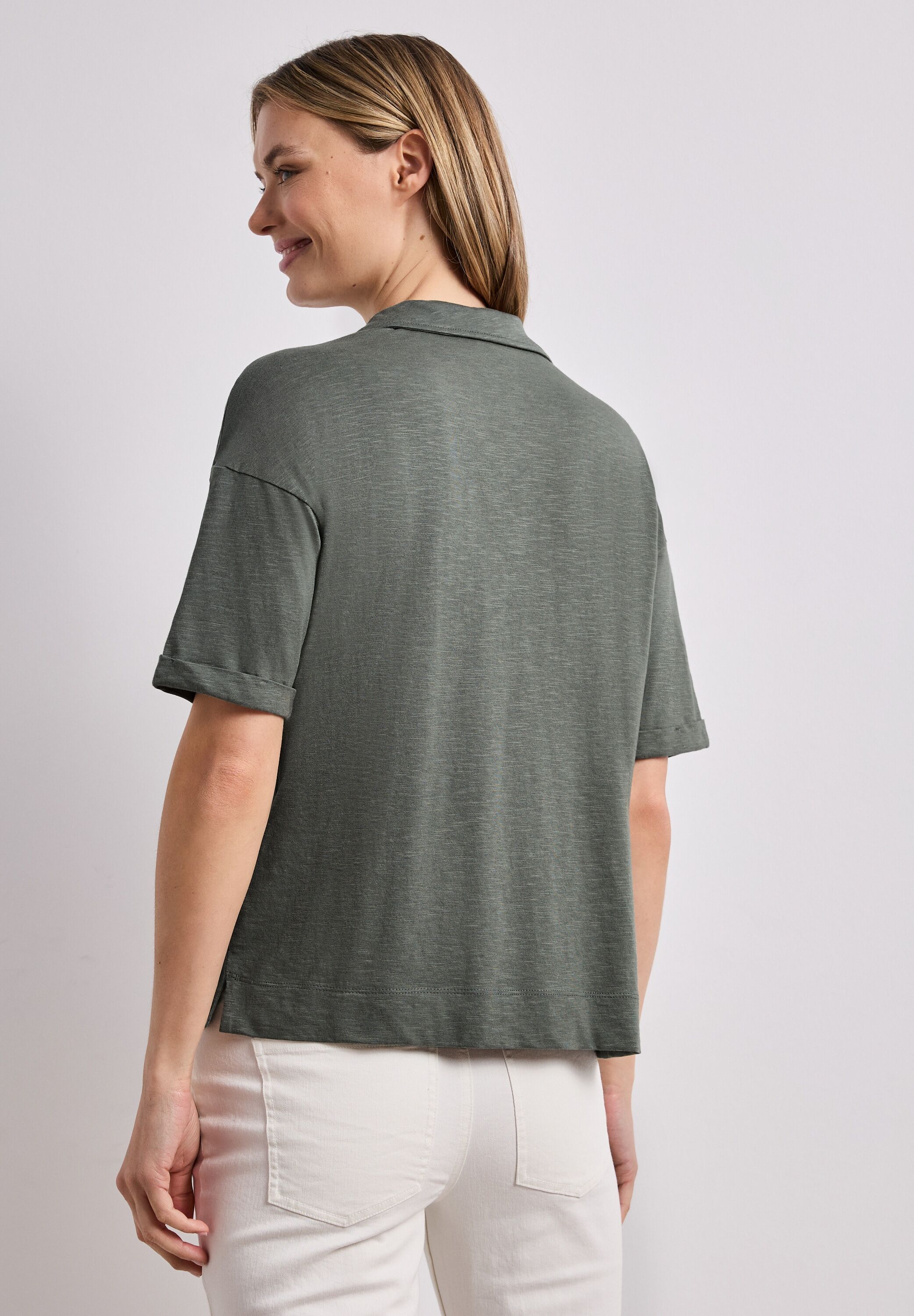 Poloshirt STREET ONE, Damen, Gr. 34, bound grün, Jersey, Obermaterial: 50% Baumwolle, 50% Modal, meliert, lässig geschnitten hüftbedeckend, V-Ausschnitt, abgesteppte Kante, Shirts Poloshirt, Sommer-Poloshirt bound grün 34