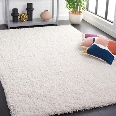 SAFAVIEH Handmade Classic Shag Nakhshun Rug