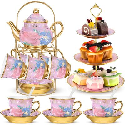 KitchenNation 21 Piece Ceramic Tea Set With Metal Holder & Cupcake Stand Elegant European Tea Pot, Cups, And Tiered Dessert Tower 21 Piece Ceramic Tea Set With Metal Holder & Cupcake Stand Elegant European Tea Pot, Cups, And Tiered Dessert Tower