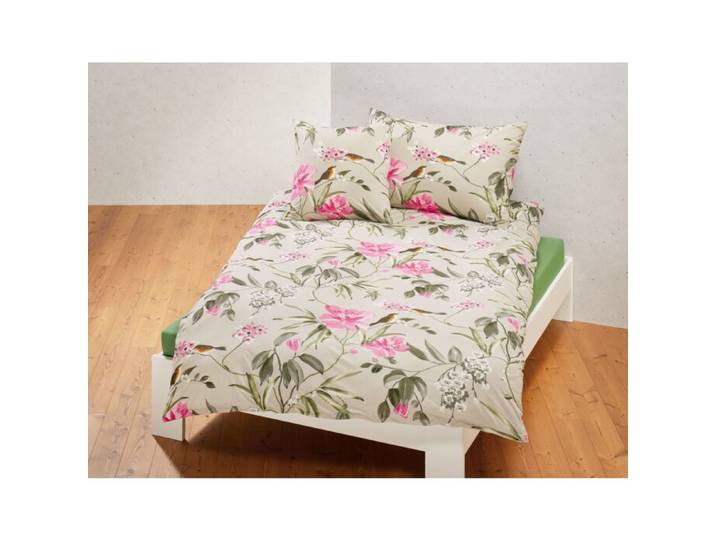 Bettwäsche mit frischem Blumenmuster auf grünem Untergrund – Kissenbezug – 65x65 cm