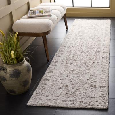 SAFAVIEH Handmade Ebony Kostoula Wool Rug