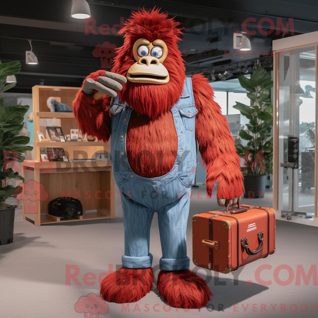 Maskottchen REDBROKOLY eines roten Sasquatch mit Jeanshemd und Aktentasche