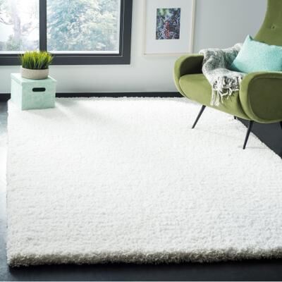 SAFAVIEH Handmade Ultimate Shag Souhair Solid Polyester Rug