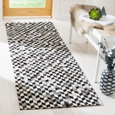 SAFAVIEH Handmade Studio Leather Antoniya Modern Leather Rug