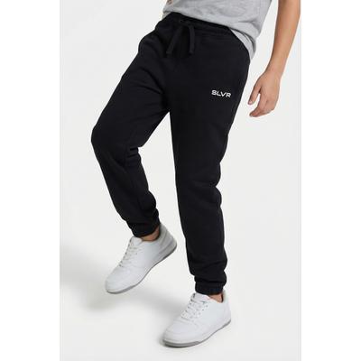 Jogginghose S.OLIVER JUNIOR, Jungen, Gr. 146, N-Gr, schwarz, Obermaterial: 100% Polyamid, unifarben, loose fit knöchellang, Hosen Jogginghose, mit Schriftzug