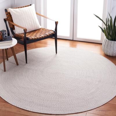 SAFAVIEH Handmade Braided Sakineh Casual Rug