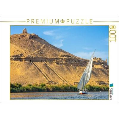 CALVENDO Puzzle Segeln vor Assuan: Feluke auf dem Nil vor den Felsengräbern | 1000 Teile Lege-Größe 64x48cm Foto-Puzzle für glückliche Stunden