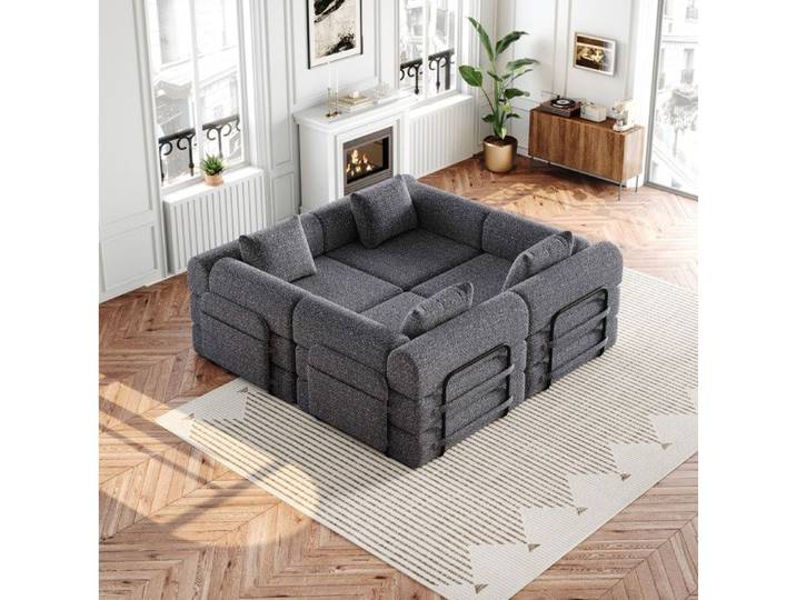 Canapé convertible modulable 4 places AESVAR en chenille grise avec rangement dans l'accoudoir