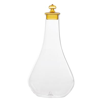 Zafferano Pirolo Flasche aus bernsteinfarbenem Borosilikatglas, mundgeblasen, mit einem eleganten, einzigartigen und skulpturalen Verschluss.