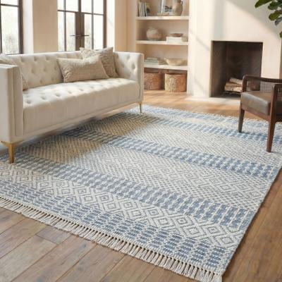 SAFAVIEH Handmade Natura Chiang Wool Fringe Rug