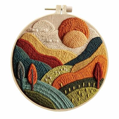 Handstickmuster für Sonnenaufgang am Berg