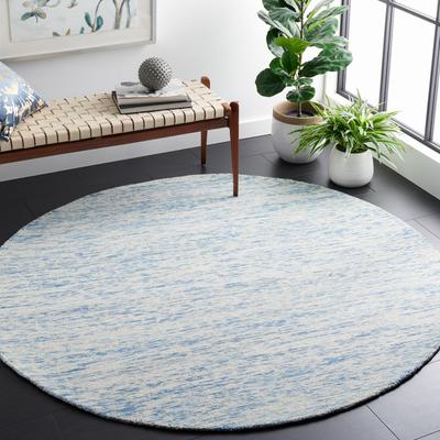 SAFAVIEH Handmade Himalaya Caitlyn Modern Wool Rug