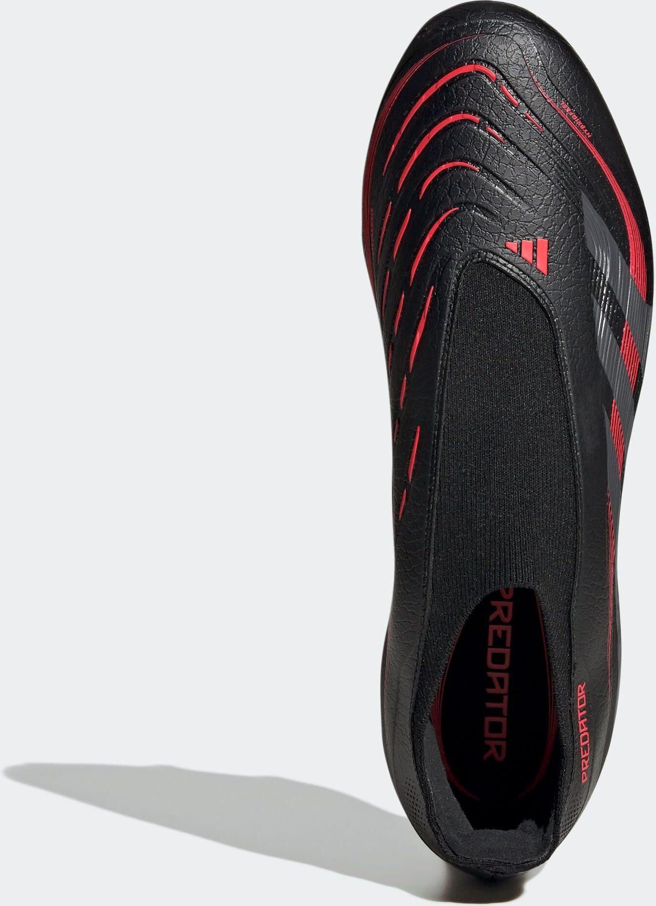Fussballschuh ADIDAS PERFORMANCE "PREDATOR LEAGUE LACELESS FG/MG", Gr. 47, schwarz (core schwarz, grau four, lucid rot), Synthetik, Schuhe Fussballschuh, für Rasenplätze core schwarz, grau four, lucid rot 47