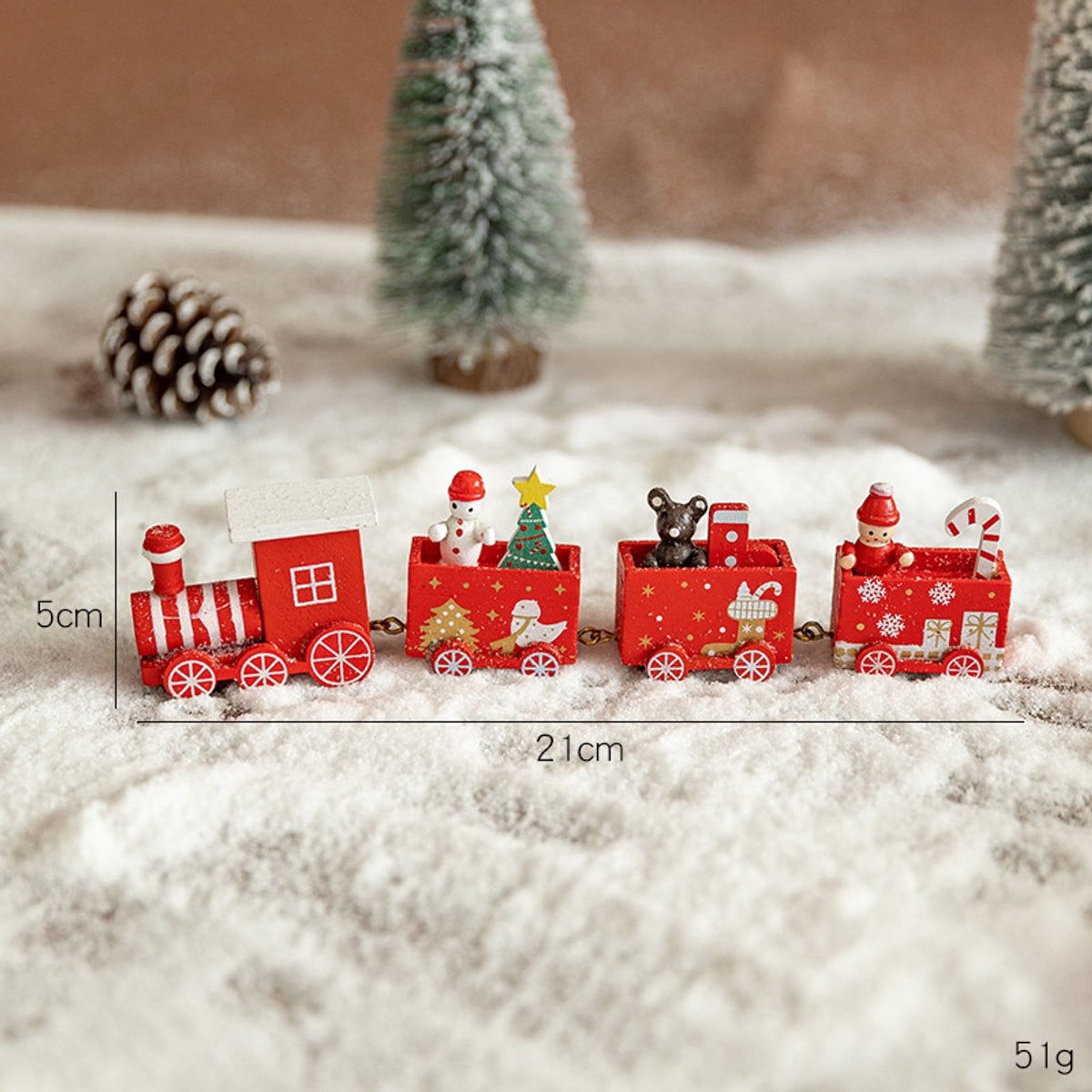 Rood-witte houten kersttrein met vier delen voor desktop of etalage
