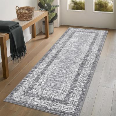 Garvee Distressed Geometric Bordered Area Rug