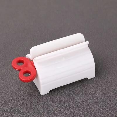 Perfect Picks Market Multifunctional Toothpaste Tube & Lotion Squeezer Clip On Bathroom Squeezing Tool For Facial Cleanser, Lotion red