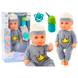 Babypuppe im grauen Pyjama pinkelt Flaschenschnullergeräusche