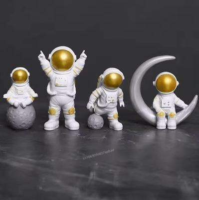 Inspire Curations 4 Piece Astronaut Figurine Set Mini Spaceman Desk Decor Educational Toy & Gift yellow 4pcs