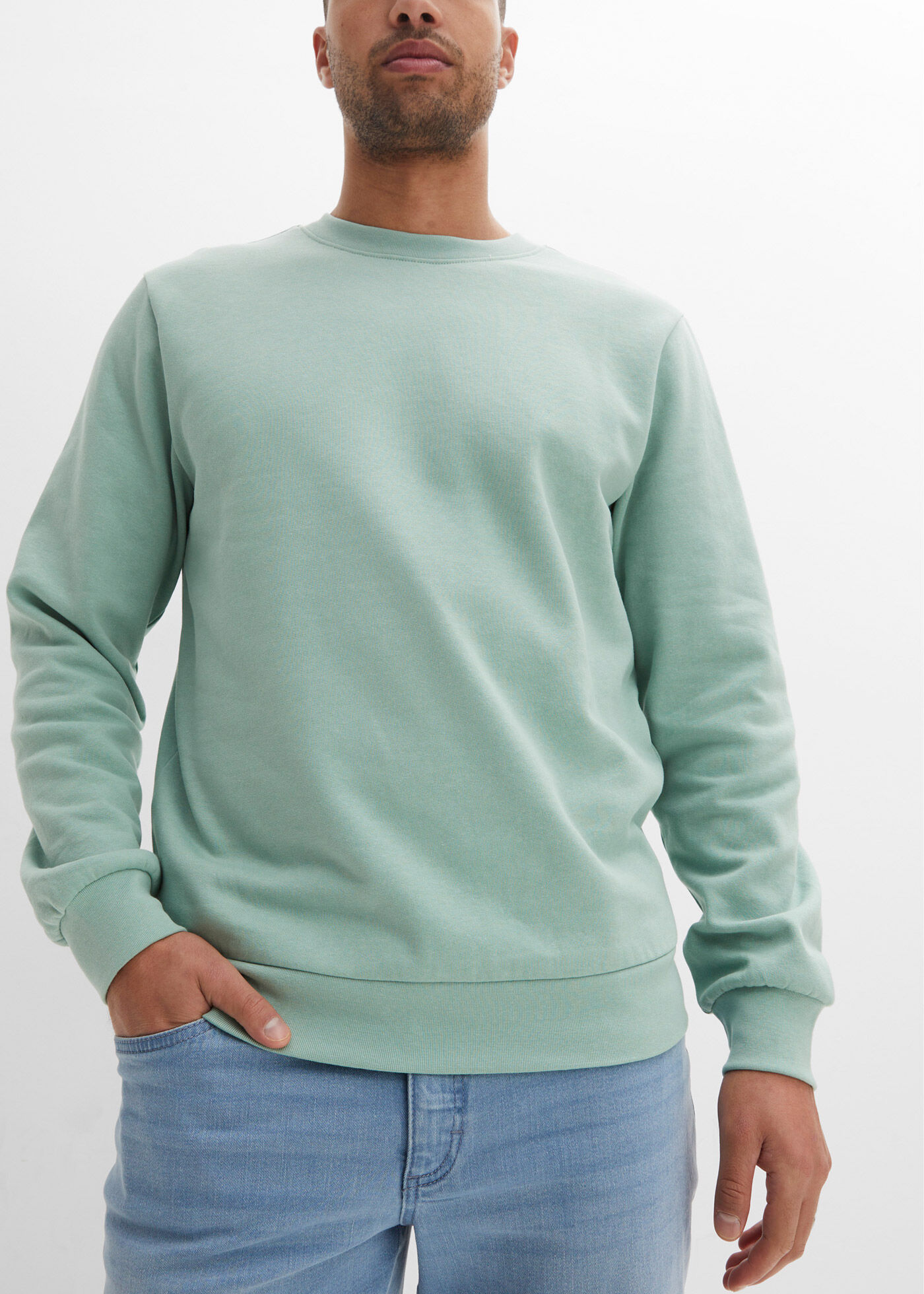 bonprix "Sweatshirt", mit weich angerauter Innenseite, aus Baumwolle und Polyester, hüftlang pastellgrün 68/70