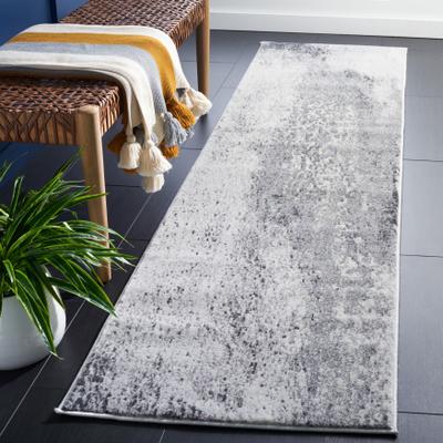 SAFAVIEH Carnegie Zheljazka Modern Abstract Rug