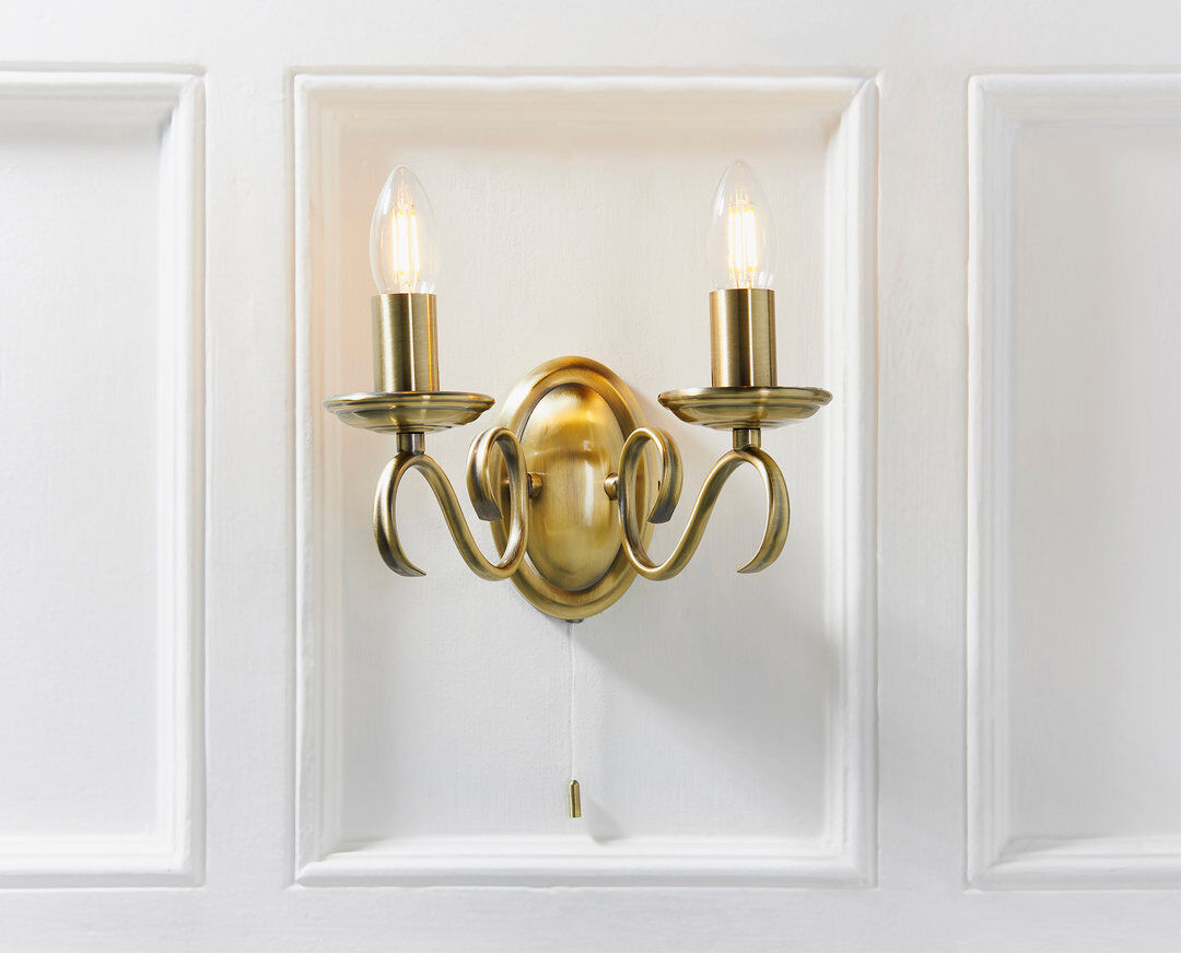 Three Posts Barney 2-Light Dimmable Single Pack Candle Wall Sconce Antique Brass 18cm H X 28cm W X 17cm D