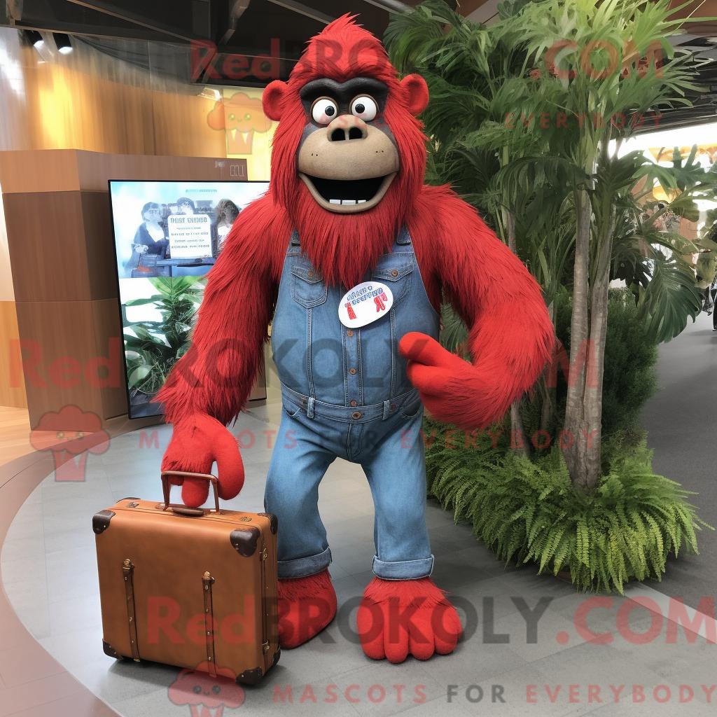 Maskottchen REDBROKOLY eines roten Sasquatch mit Jeanshemd und Aktentasche