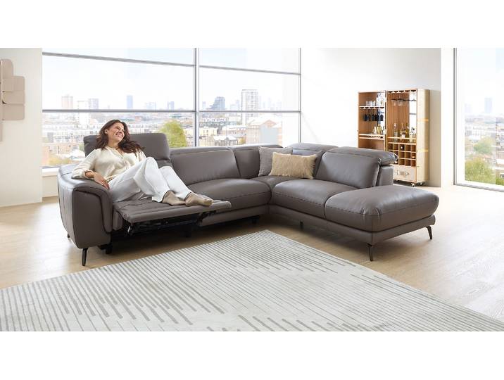 Leder Couch mit motor. Relaxfunktion und Kopfteilverstellung