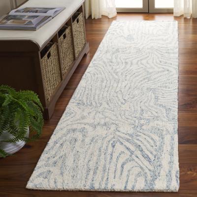 SAFAVIEH Hand-Tufted Ebony Roghieh Modern & Contemporary Wool Rug