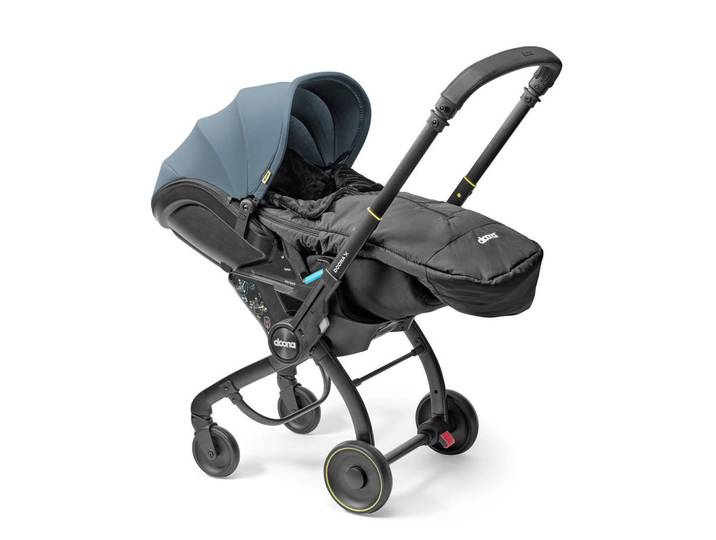 Doona Babyschalen-Fusssack Doona, Schwarz, Füllung: Polystyrol, 42x18x93 cm, wasserabweisend, Winterfußsack, Gurtschlitze, Baby on Tour, Babyschalen, Babyschalenzubehör