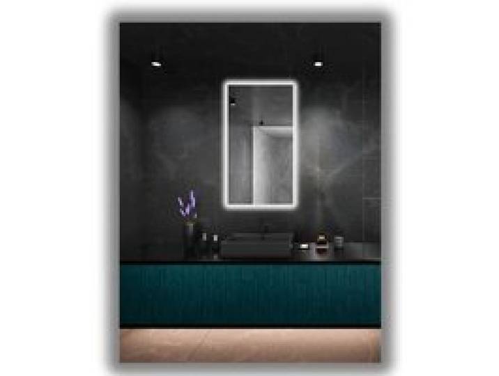 Miroir lumineux LED 65x115 mm étanche IP65 à suspendre verticalement ou horizontalement.