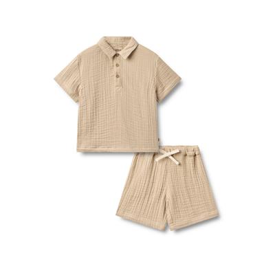 Trainingsanzug WHEAT "WHEAT Set Shirt S/S & Shorts Svend", Mädchen, Gr. 122, beige (warm sand), 100% Baumwolle (Bio), unifarben, Sportanzüge Trainingsanzug