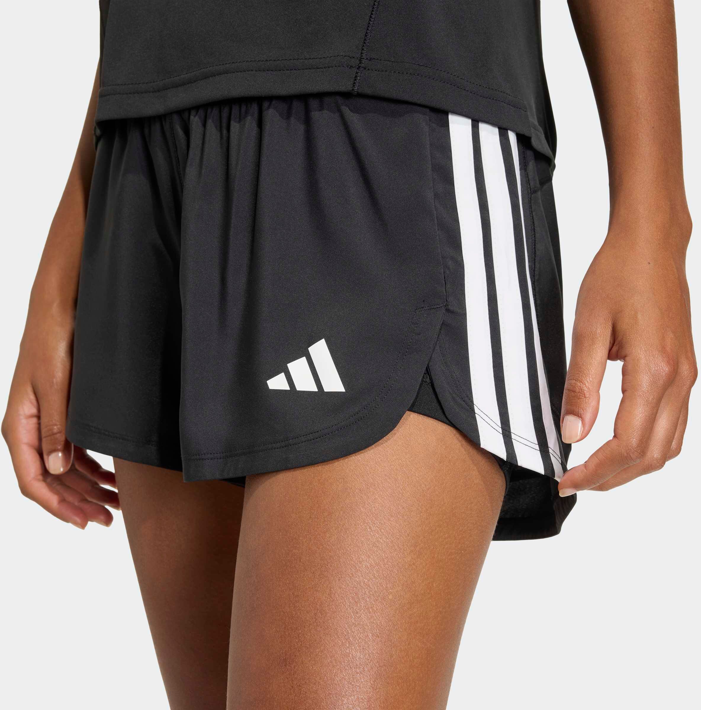 Shorts ADIDAS PERFORMANCE "PACER WORKOUT WOVEN 2IN1", Damen, Gr. L, N-Gr, schwarz-weiss (schwarz, normal, gr.), Obermaterial: 100% Polyester, Hosen Shorts schwarz, normal, gr. L, N-Gr