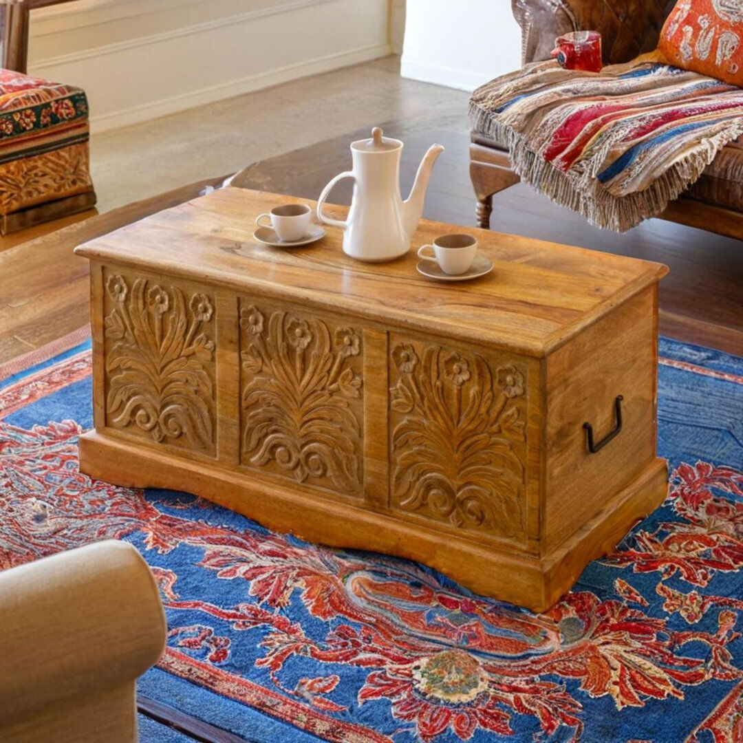 Union Rustic Holcombe Carved Acacia Wood Coffee Table with Storage