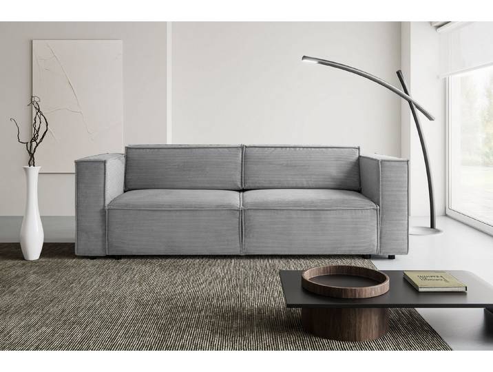 WERK2 Schlafsofa Kansas Breite 252 cm, modern & bequem, viel Platz, kubisches Design, Cord, Bettkasten