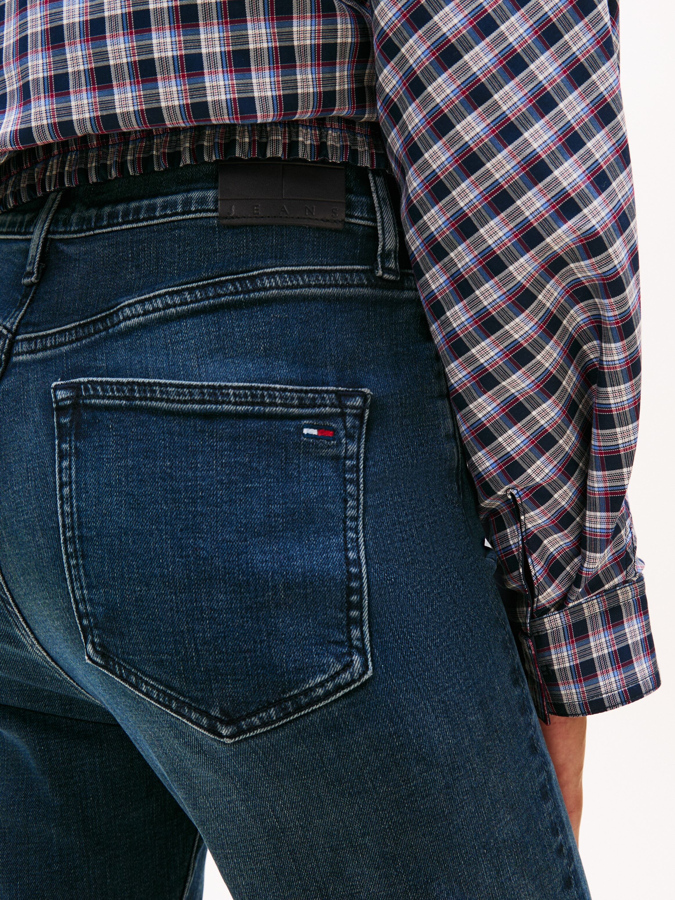 Bootcut-Jeans TOMMY JEANS "SYLVIA HGH FLR", Damen, Gr. 26, Länge 30, blau (denim blau schwarz), Denim/Jeans, Obermaterial: 98% Baumwolle, 2% Elasthan, unifarben, ausgestellt knöchellang, Jeans Bootcut-Jeans, Weite Beinform und Logo Stickerei auf der Gesäs