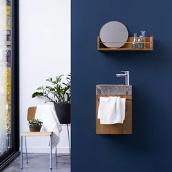 Badunterschrank hängend aus Teakholz mit grauem Marmorwaschbecken Stelle grey