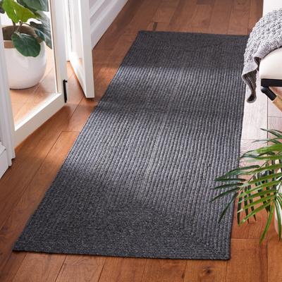 SAFAVIEH Handmade Braided Sakineh Casual Rug