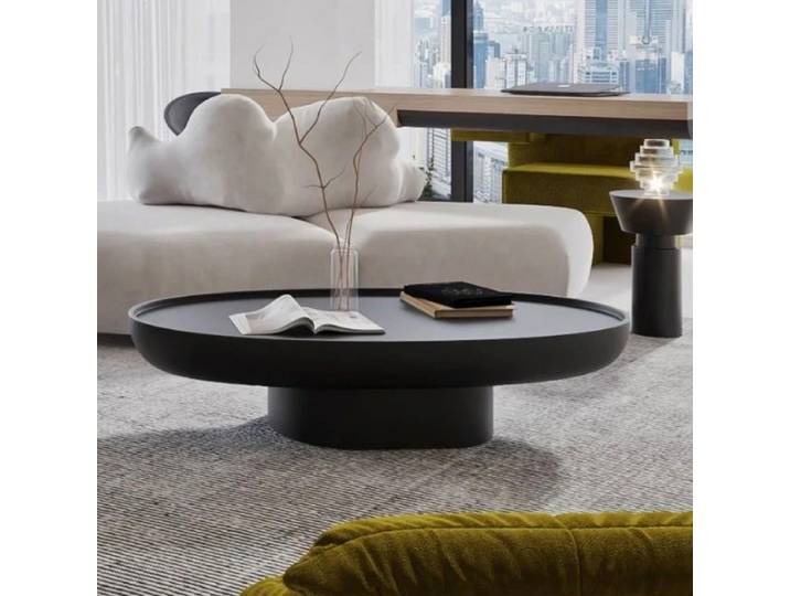 Table basse ovale moderne et décorative, design simple, grande table de salon foncée, mobilier de salon design.