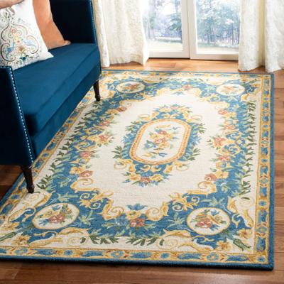 SAFAVIEH Handmade Micro-Loop Nalini Wool Rug