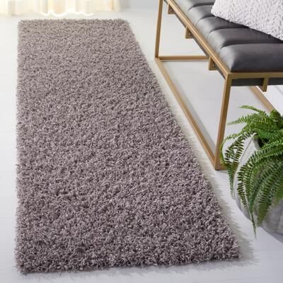 SAFAVIEH Handmade Monterey Shag Mevlide Solid Polyester Rug