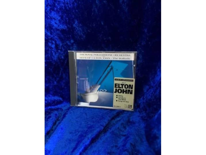 ...Plays Elton John