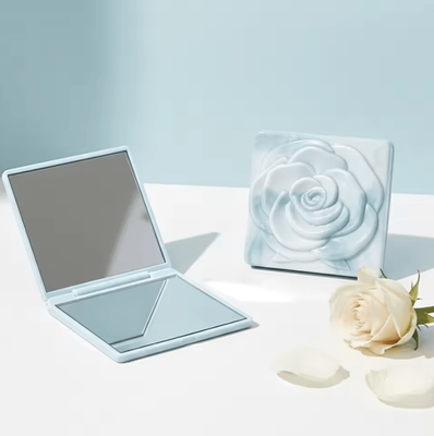 Inspire Curations 7cm Rose Folding Pocket Makeup Mirror With Storage Bag sky Blue