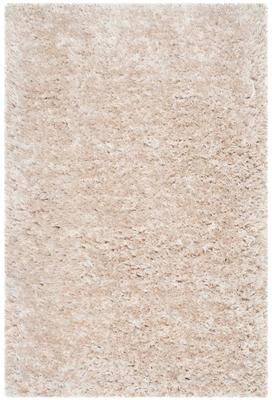 SAFAVIEH Handmade South Beach Leonella Shag Solid Polyester Rug