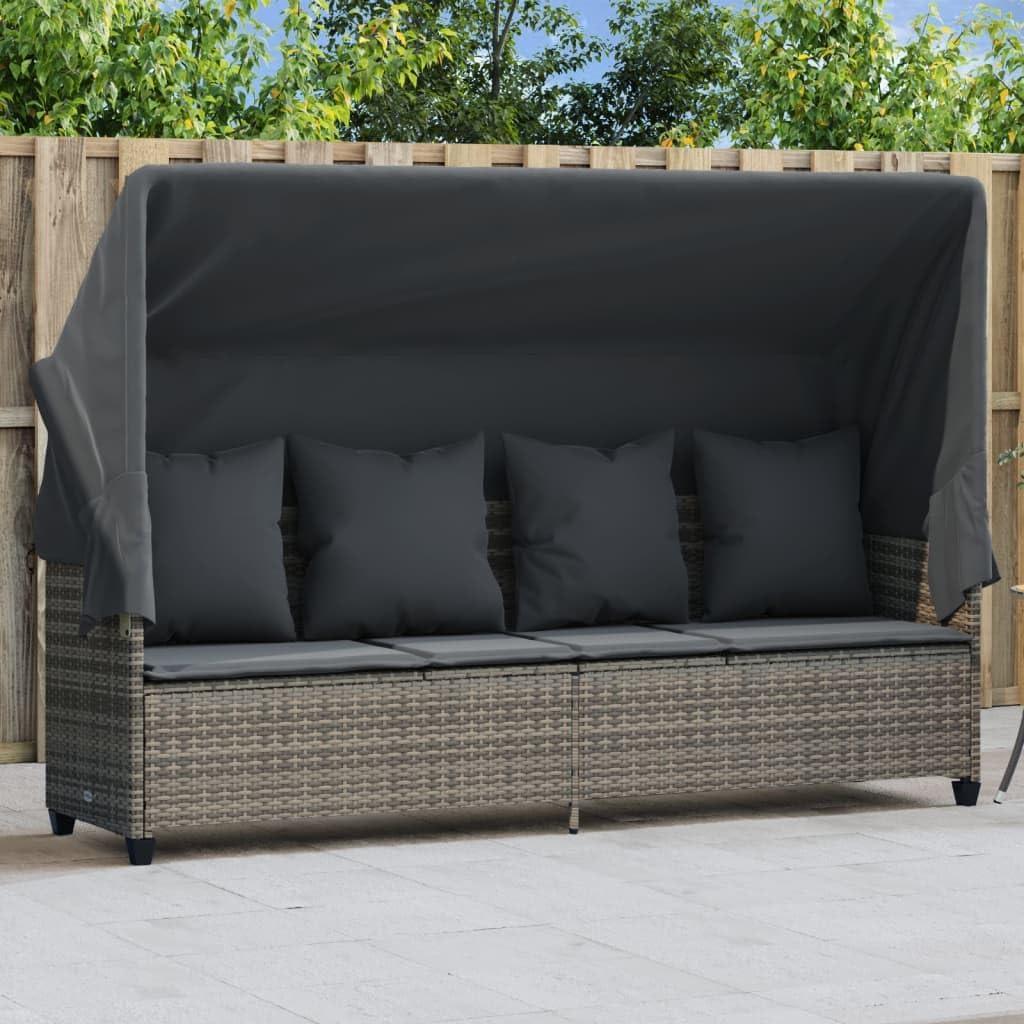 Graue Sonnenliege aus Poly-Rattan mit Dach und Kissen für den Garten